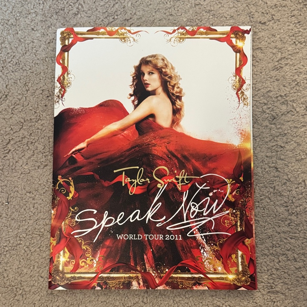 Speak Now Taylor Swift tour book with poster
